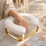 Beli jastuk u obliku slova U sa zlatnom bazom — naslon za manikir